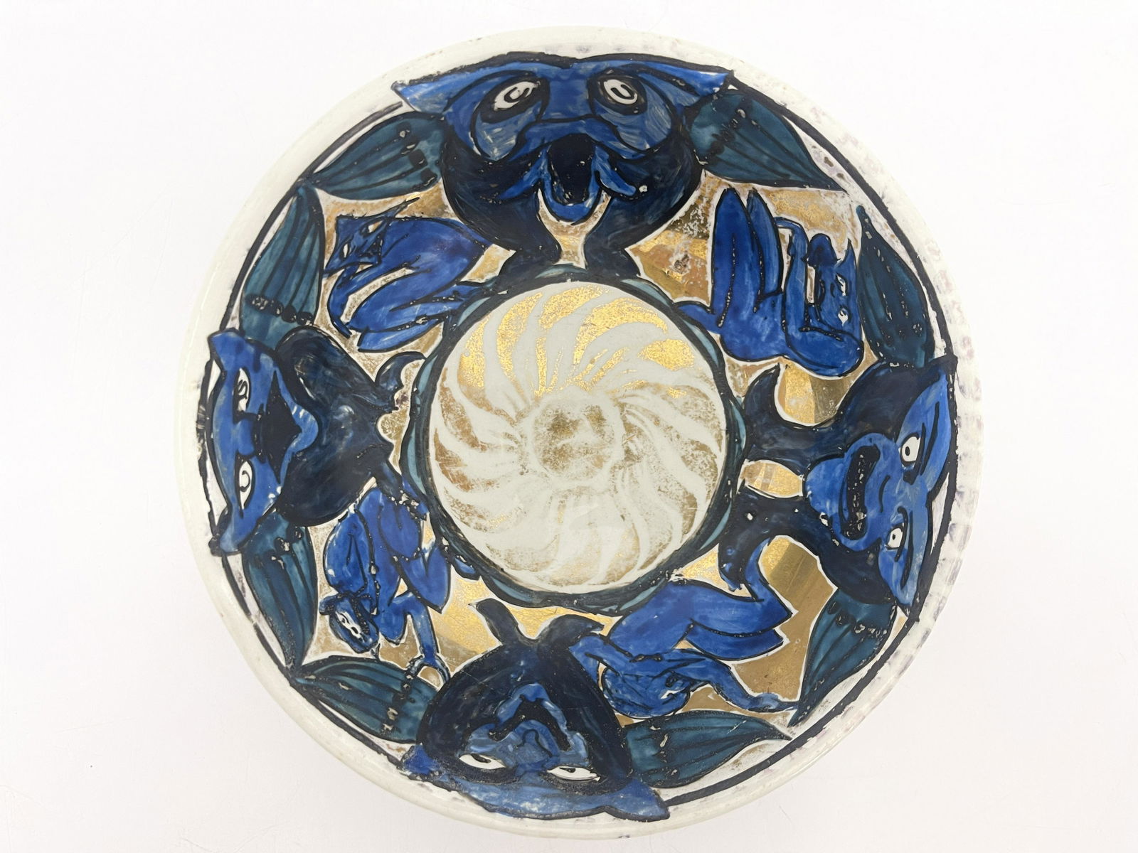 John Pearson, an Arts and Crafts lustre: John Pearson, an Arts and Crafts lustre bowl, circa 1900, painted with a band of grotesque zoomorphic foliate creatures between imps and pixies, on a gold lustre ground, the exterior with geometric la
