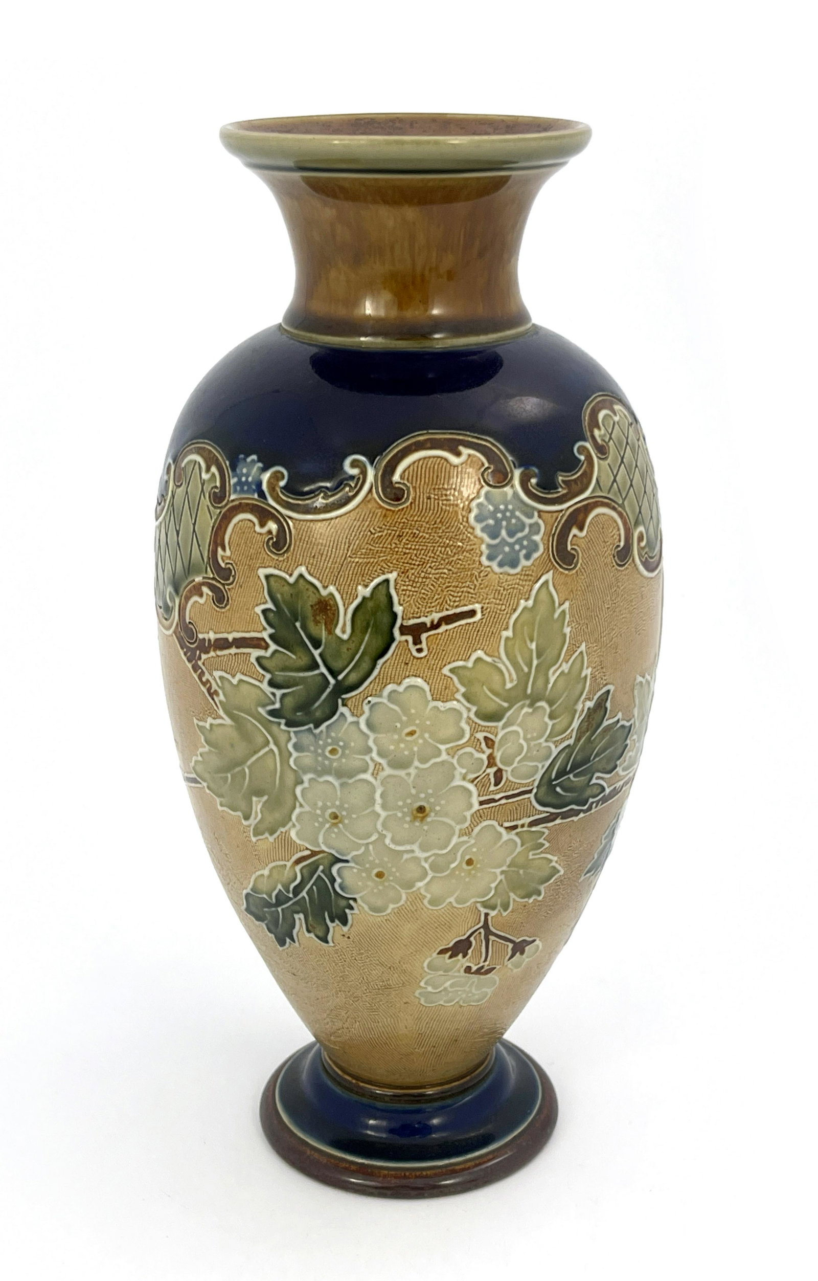 A Royal Doulton stoneware vase, circa 19: A Royal Doulton stoneware vase, circa 1905, inverse baluster form, tubelined with leaf and berry design in a scroll border, impressed and incised marks, 30cm high