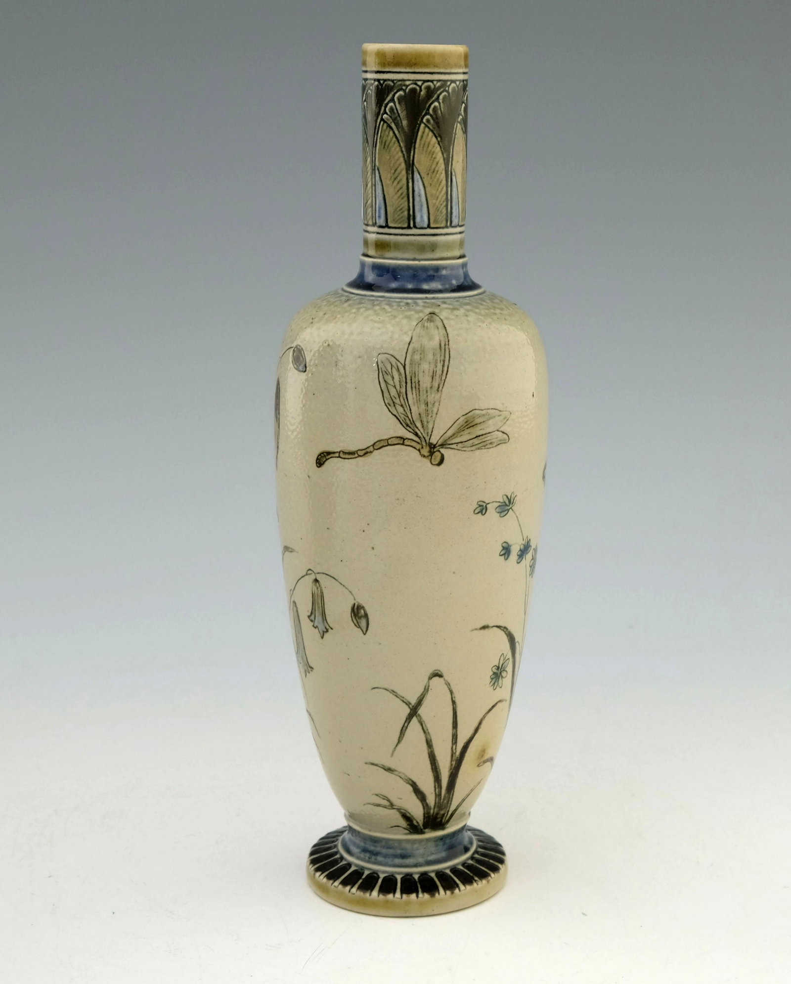 Edwin Martin for Martin Brothers, a ston: Edwin Martin for Martin Brothers, a stoneware wildflower vase, 1883, shouldered form, sgraffito decorated with dragonflies and butterfly in flight over bluebells and other plants, salt glazed, incised
