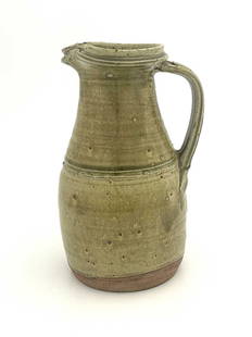 Richard Batterham (British, 1936-2021),: Richard Batterham (British, 1936-2021), a large jug, double spout, ribbed handle, green ash glaze, 28cm high. Note: Artist Resale Rights apply