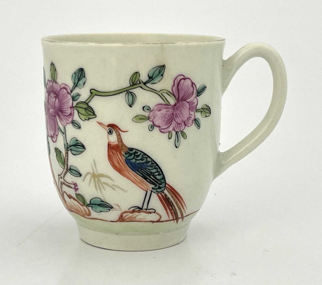 A Worcester outside decorated coffee cup: A Worcester outside decorated coffee cup, circa 1770, painted in the Chinese style with rock, peony and birds, 6.5cm high