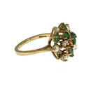 A 9ct gold emerald and split pearl clust