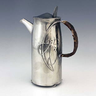 Archibald Knox for Liberty and Co., a Tu: Archibald Knox for Liberty and Co., a Tudric Arts and Crafts pewter coffee pot, model 0231, tapered cylindrical form, cast with knotted tendril motifs and looped rattan handle, on skate feet, conical