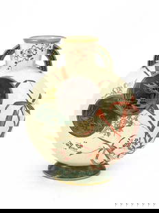 An Aesthetic Movement moon flask, possib: An Aesthetic Movement moon flask, possibly Minton, circa 1880, bead moulded twin handles, painted with roundels of birds amongst foliage in the Japonesque manner on a bamboo ground, painted No.1196 to