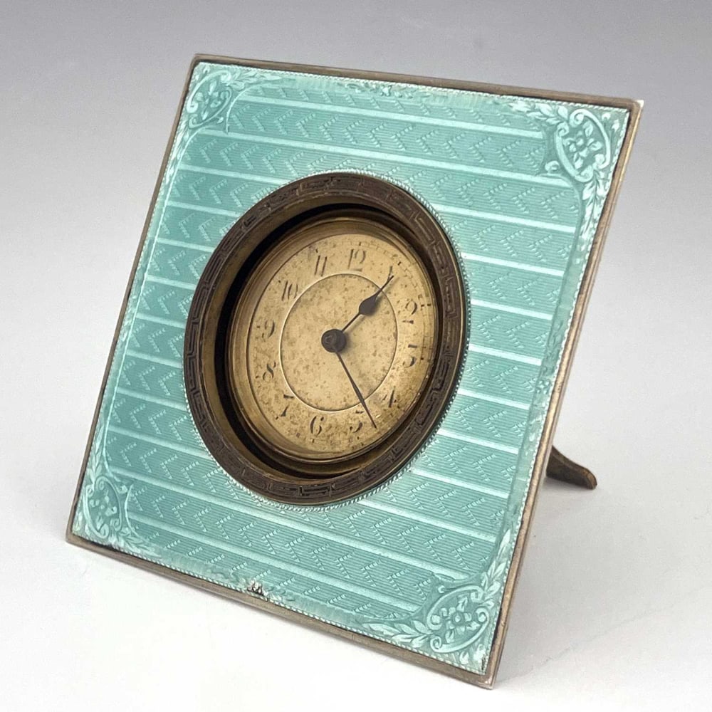 An Art Deco silver and enamelled clock, (1 of 6)
