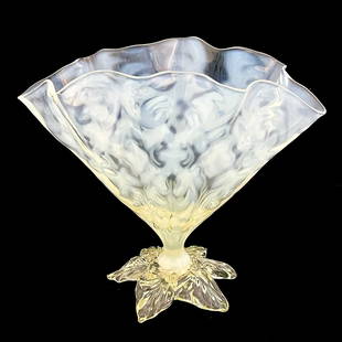 John Walsh Walsh, an Arts and Crafts opa: John Walsh Walsh, an Arts and Crafts opaline brocade glass vase, circa 1897, the crimped handkerchief body with optic moulded foliate pattern, on a leaf textured fix petal foot, 17.5cm high Note: see