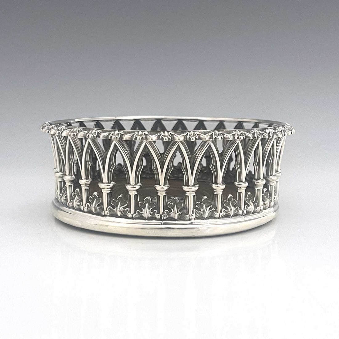 An early Victorian single bottle coaster (1 of 5)