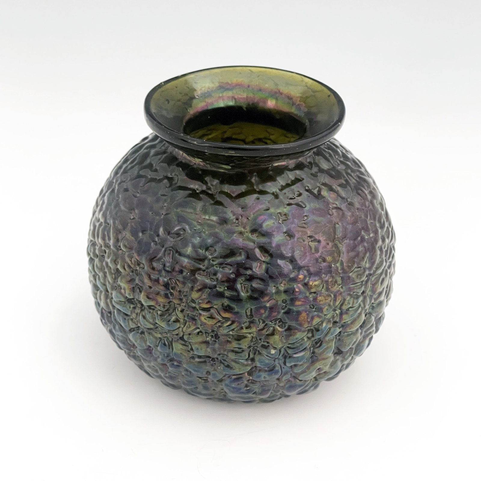 Thomas Webb and Sons, an iridescent glass Bornze Ware vase, circa 1880, textured spherical form with: Thomas Webb and Sons, an iridescent glass Bornze Ware vase, circa 1880, textured spherical form with everted rim, 11cm high