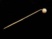 A freshwater Scottish pearl stick pin, 9