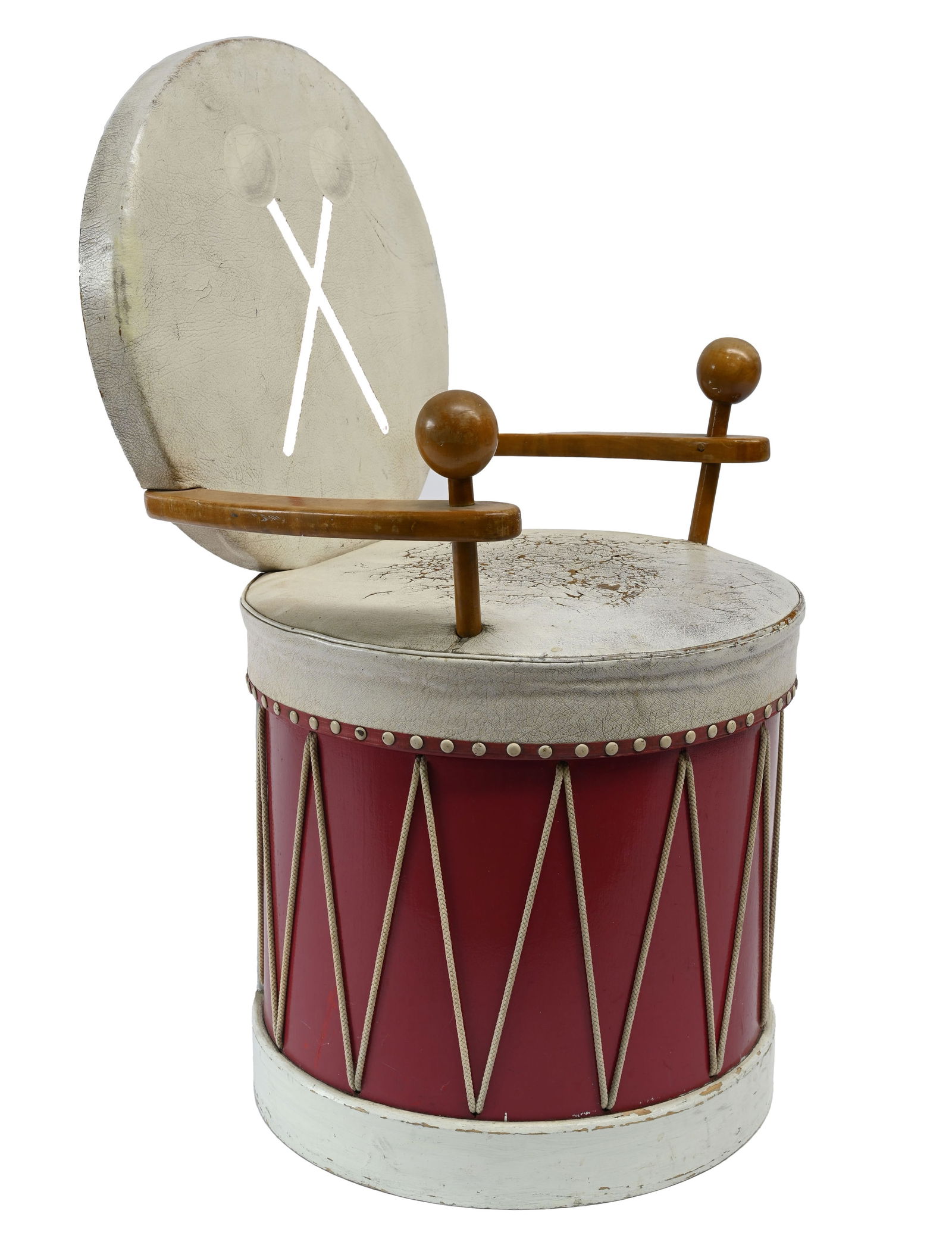 Cecil Beaton (British, 1904-1980), a cir: Cecil Beaton (British, 1904-1980), a circus drum armchair, circa 1935, painted leather, wood and rope, the chair seat of cylindrical form, the arm supports styled as batons, the round back painted wit
