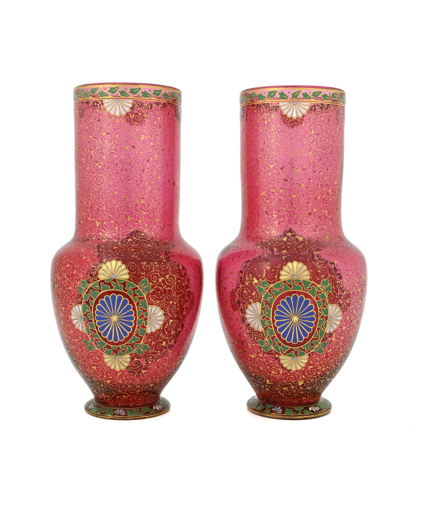 A pair of Aesthetic Movement cased ruby: A pair of Aesthetic Movement cased ruby glass and enamelled portrait vases, possibly Jules Barbe and William Stephen Coleman for Thomas Webb and Sons, Stourbridge, circa 1885, footed and shouldered bu