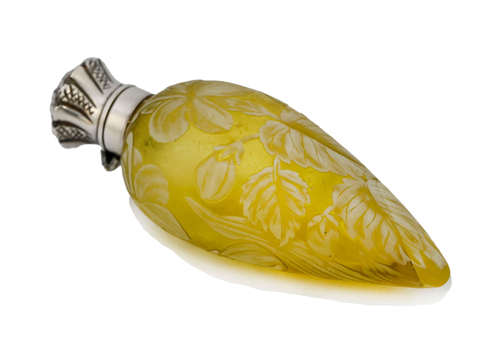 Thomas Webb and Sons, a cameo glass scen: Thomas Webb and Sons, a cameo glass scent bottle, circa 1885, the white cased yellow ground pointed amphora form body carved with hibiscus type flowers, silver coloured metal mount with internal stopp