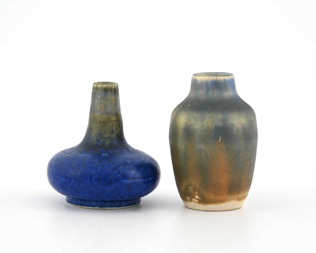 Ruskin Pottery, two miniature Crystallin: Ruskin Pottery, two miniature Crystalline vases, circa 1930, shouldered form and squat onion form, one of matte blue over orange, the other mottled blue over a grey body, impressed marks and paper lab