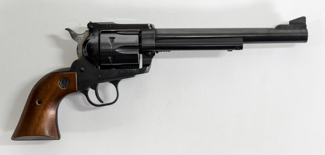 Ruger Blackhawk 200th Anniversary Revolver: Ruger new Model Blackhawk Commemorative Revolver. Excellent condition in popular .45 caliber. Ideal shooter in longer target barrel. Function is excellent. Only a few blems or dings around the gun.