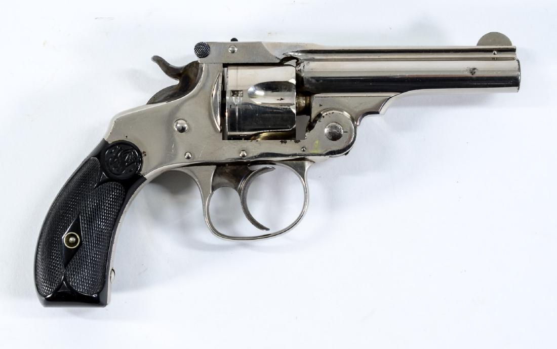 S&W .32 DA 4th Model Revolver: Smith & Wesson .32 Double Action 4th Model Revolver. Earlier Antique Range Serial Number: 97433 (matching on cylinder and frame). Nickel Plated, chambered in .32. 3" bbl. Scattered Finish pitting and