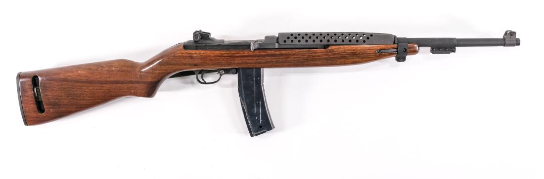 IAI M1 Carbine Reproduction rifle: This IAI M-1 reproduction, 18" barrel and one 15rd magazine. The gun is in excellent overall condition. Traditional military walnut stock with minor surface scratches and no chips, cracks or repairs. 