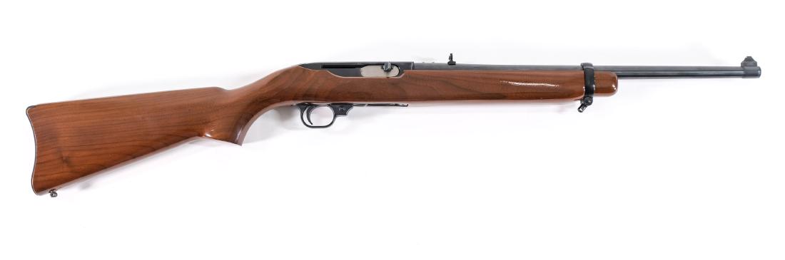 Ruger Model 44 Carbine Rifle: Sturm Ruger & Co. carbine in .44 magnum with a 19" barrel. This rifle is in excellent overall condition. The hardwood is in good condition with a small chip where the sling swivel meets the wood stock