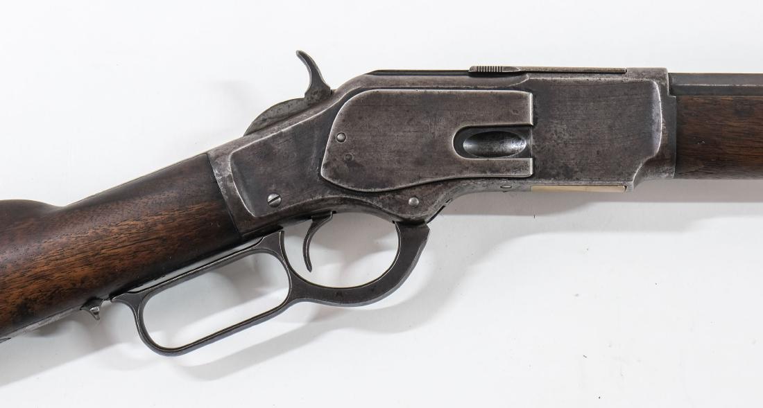 Winchester Model 1873 Lever Action Rifle 44 WCF: Winchester Lever Action Repeating Rifle with 24" octagonal barrel and full length magazine tube, chambered for 44 WCF. Serial Number dates this gun to 1901. There is about 50% finish on the barrel and
