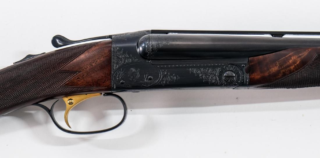 Winchester / CSMC model 21 .410 Shotgun: Rare, Near new Model 21, heavily engraved Winchester pattern 5 receiver. Fine example of a well engraved sub gauge side by side shotgun. This .410 26" barreled shotgun has a red bead front sight on to