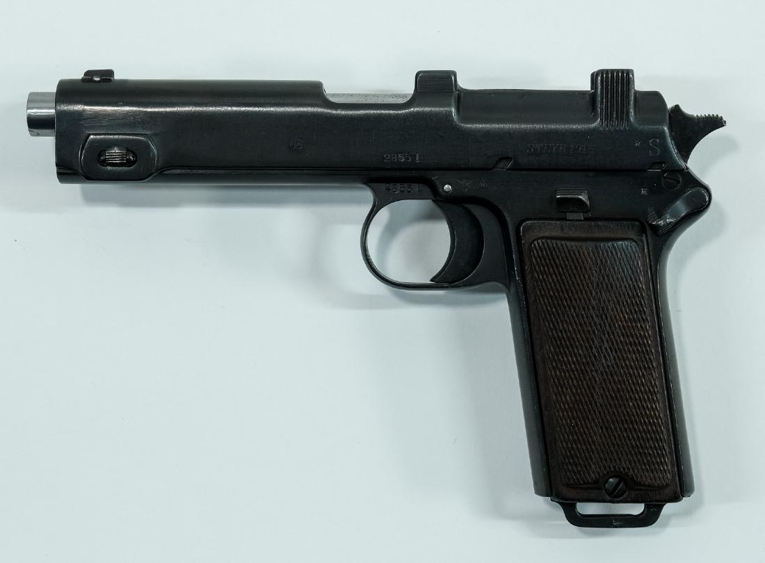 Steyr-Hahn M1912 9mm Pistol: Steyr Hahn M1912 Pistol with fixed sights, 5" bbl, 8-round internal magazine and Walnut grips. Serial Number 28551 Matching on the Frame and Slide. originally a WWI Astro Hungarian pistol, which was r
