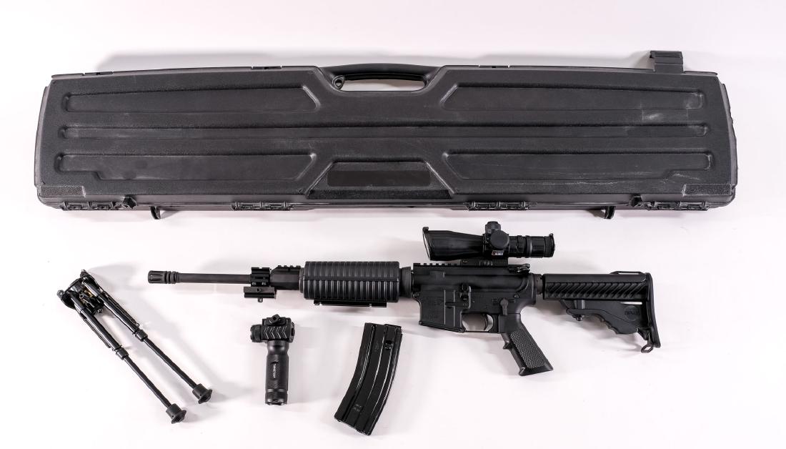 DPMS A-15 AR Rifle .223: Like New in case with papers and many accessories. Appears unfired. Only minor handling marks/blems. A3 style flat top with drop in hand guard. Adjustable stock. Vert grip, Target Sports 3-9x42 Tactic