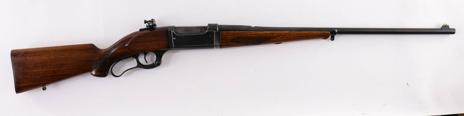Savage Model 99 .300 Savage Rifle: Savage Model 99 Lever Action Takedown Rifle in .300 Savage. Circa 1926 with Round Counter and loaded chamber indicator, fitted with adjustable Redfield peep sight. Stocks refinished, about 60% blue, G