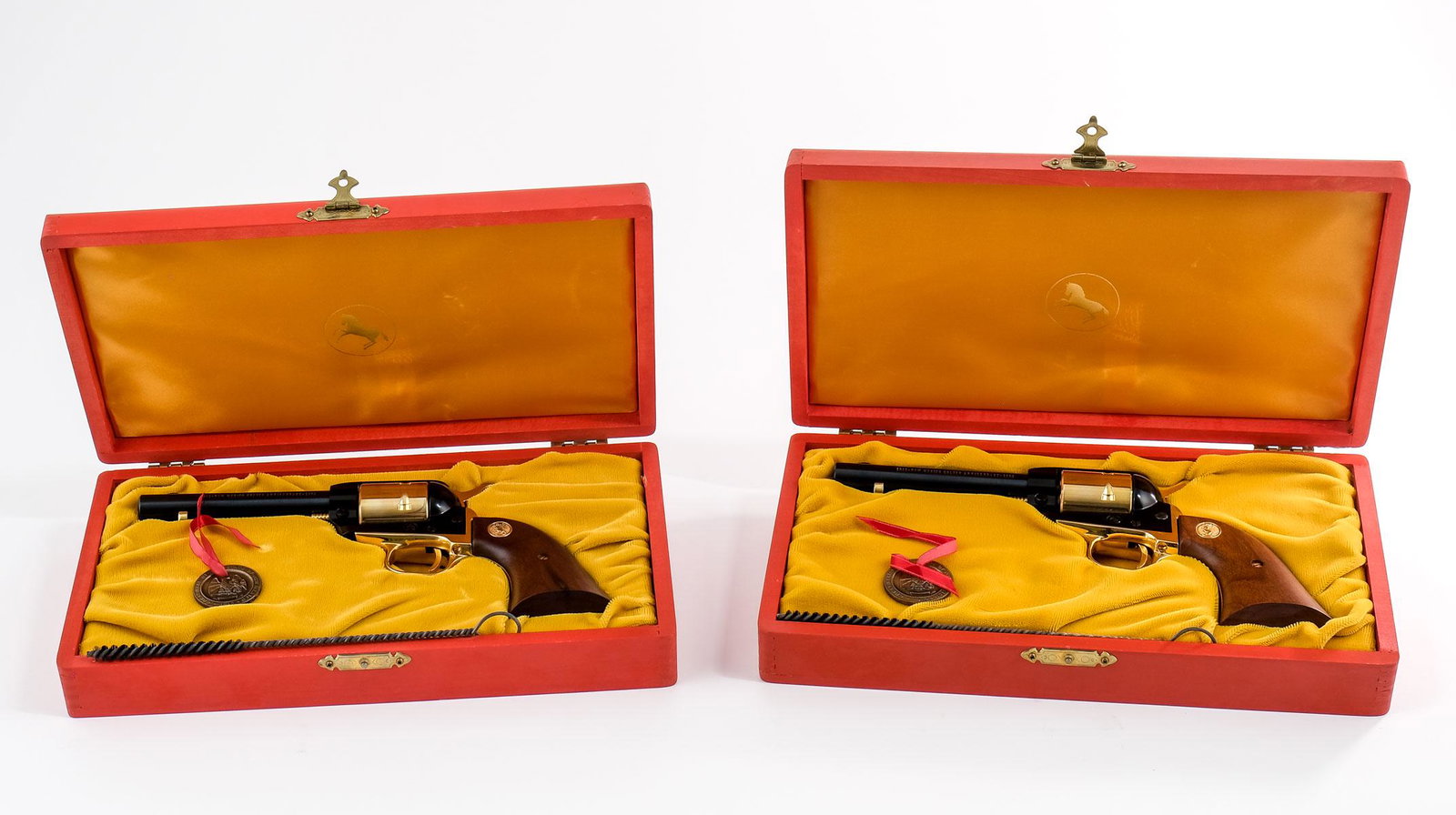 Colt New Mexico Golden SEQUENTIAL pair: Made by Colt in 1962 in limited quantities to celebrate the 50th anniversary of New Mexico being admitted as the 47th State of the United States Based on a Colt Frontier Scout revolver. This sequentia