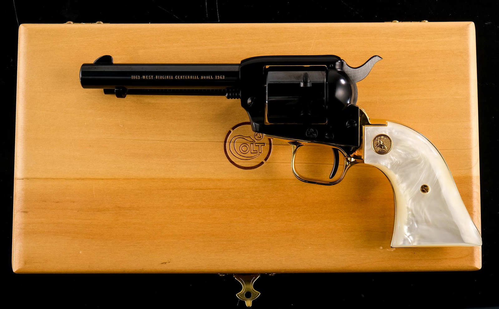 Colt W. VA Centennial Frontier Scout C&R: Made by Colt in 1964 in limited quantities to celebrate the 100th anniversary of West Virginia being admitted as a State of the United States. Colt Frontier Scout revolver with a 4.75" barrel. Resting
