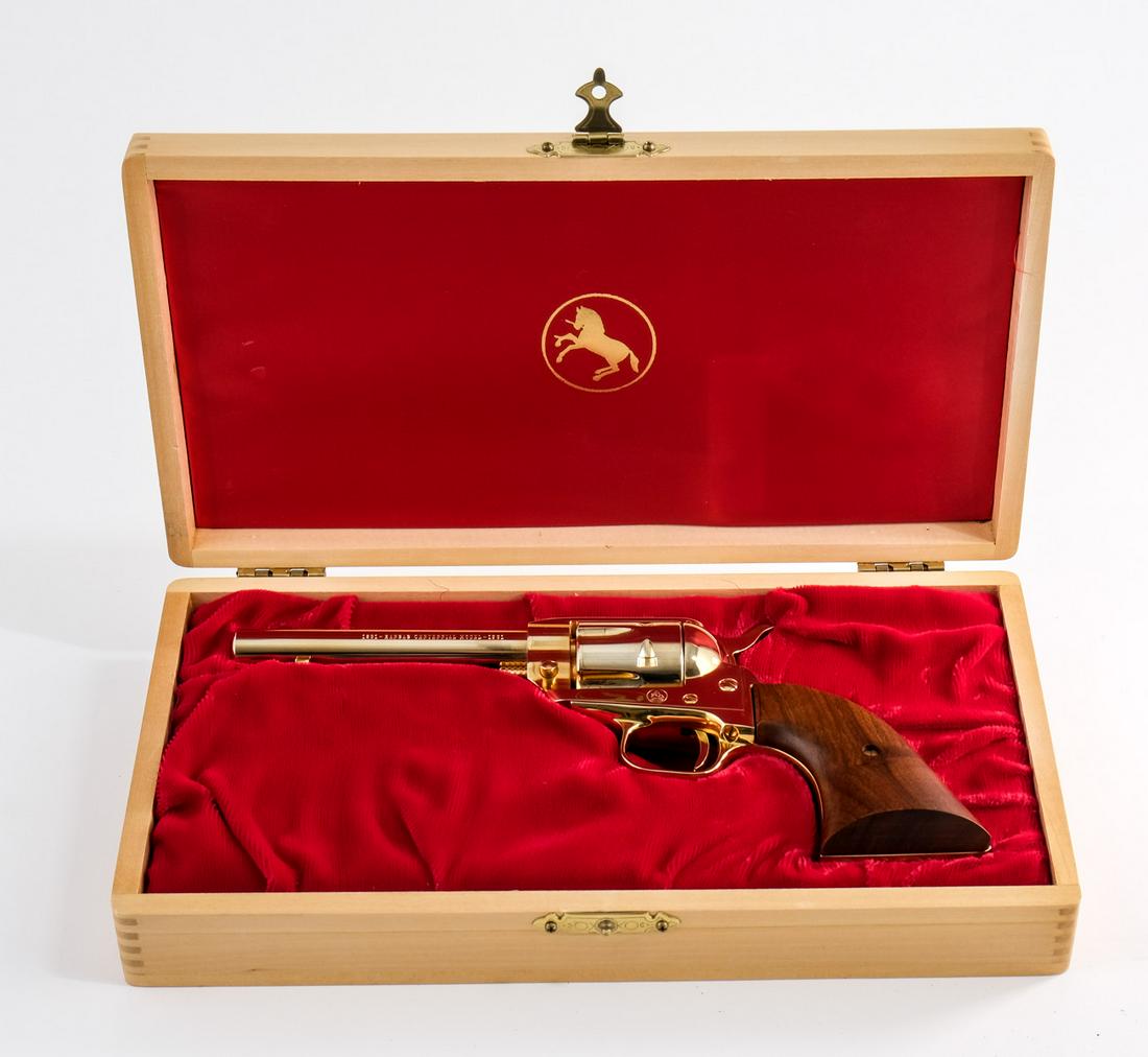 Colt Kansas Centennial Frontier Scout C&R: Made by Colt in 1961 in limited quantities to celebrate the 100th anniversary of Kansa being admitted as a State of the United States. Colt Frontier Scout 4.75" .22lr revolver adorn with gold plating 