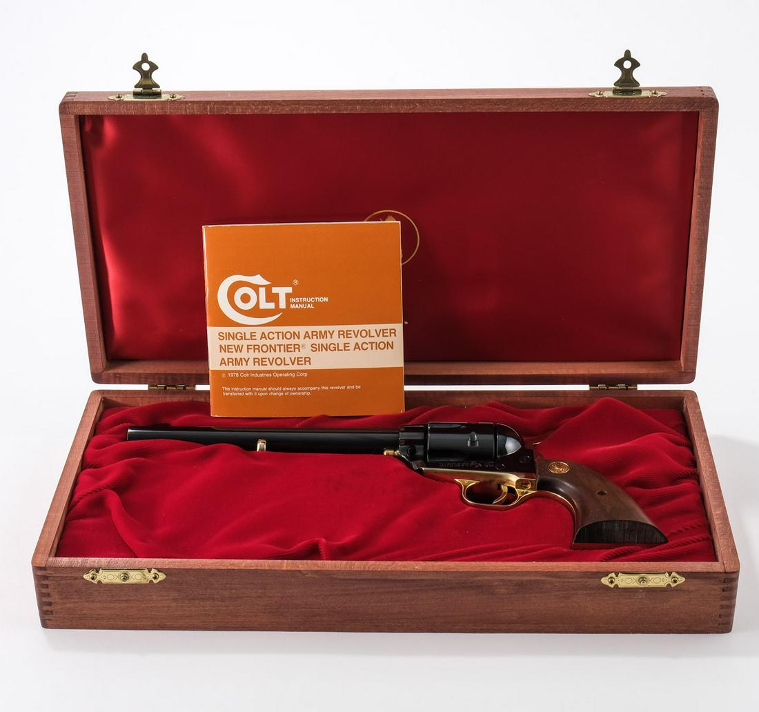 Colt 125th Anniv SAA .45 C&R (1961): Highly desirable Colt factory commemorative tastfully presented in mahogany case. This gun commemorates the 125th anniversary of Samuel Colts business (1836 in Patterson NJ, issued in 1961). 7.5" barr