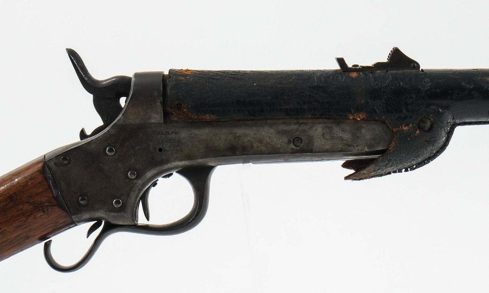Sharps & Hankins 1859 Navy Carbine: Sharps & Hankins 1859 single shot, breech loading Navy Carbine. This Sharps and Hankins .52 caliber rim fire rifle, patented in 1859 and with a leather wrapped barrel, was used by the Navy. When the t