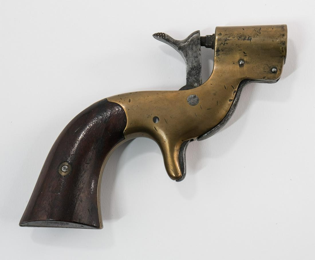 U.S. Army 1862 Signal Pistol: Civil War era U.S. Army Model 1862 Signal Pistol. This signal pistol is heavy brass with wood grips, spur trigger and a lever and toothed jaw that holds the flare in place. This is marked on the butt:
