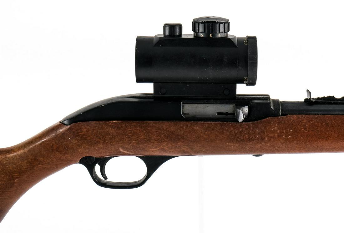 Marlin Model 60 Rifle .22 LR: Marlin Model 60 in .22 long rifle semi-automatic with a fifteen round internal capacity and a 22" barrel. The plastic butt plate is in very good condition with little wear and no damage. The wood stoc