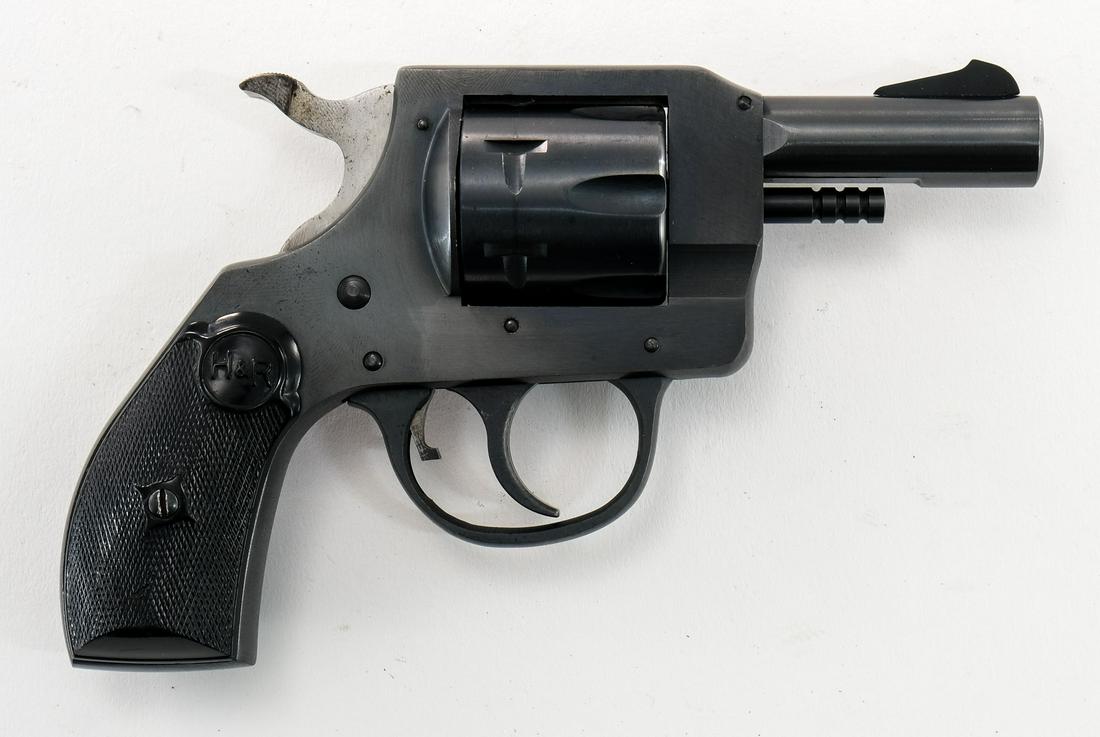 Harrington & Richardson 732 .32 S&W Long Revolver: H&R model 732 in .32 Smith & Wesson Long with a six shot capacity and a 2 1/2" barrel. The H&R plastic grip plates are in excellent condition with little wear and no damage. The frame is in excellent