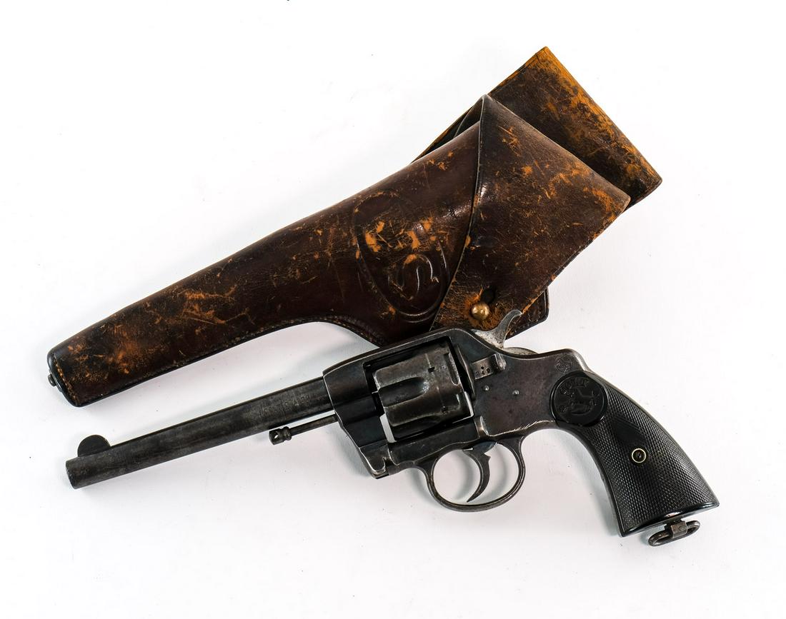 Colt New Army Model 1884 DA .38 Revolver: Colt model 1894 double action revolver in .38 caliber with a six shot capacity and a 6" barrel. The Colt plastic hand grip plates are in fair condition with heavy handling wear no damage. The frame is