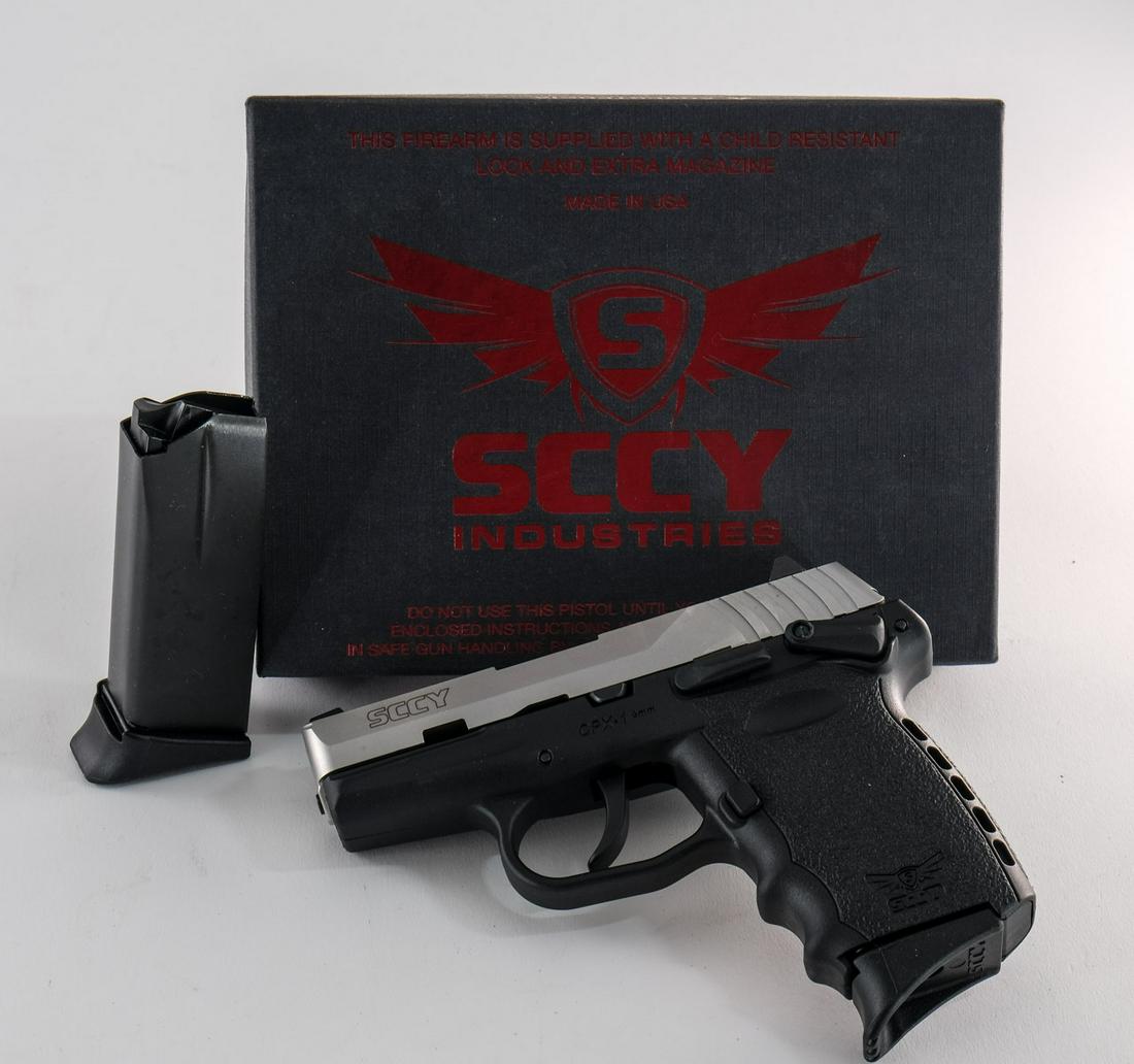 SCCY Firearms CPX-1 9mm Pistol: SCCY Firearms CPX-1 in 9mm with two ten round removable magazines and a 3" barrel in a black frame with stainless slide. This double action only semi-automatic pistol is new old stock never being fire