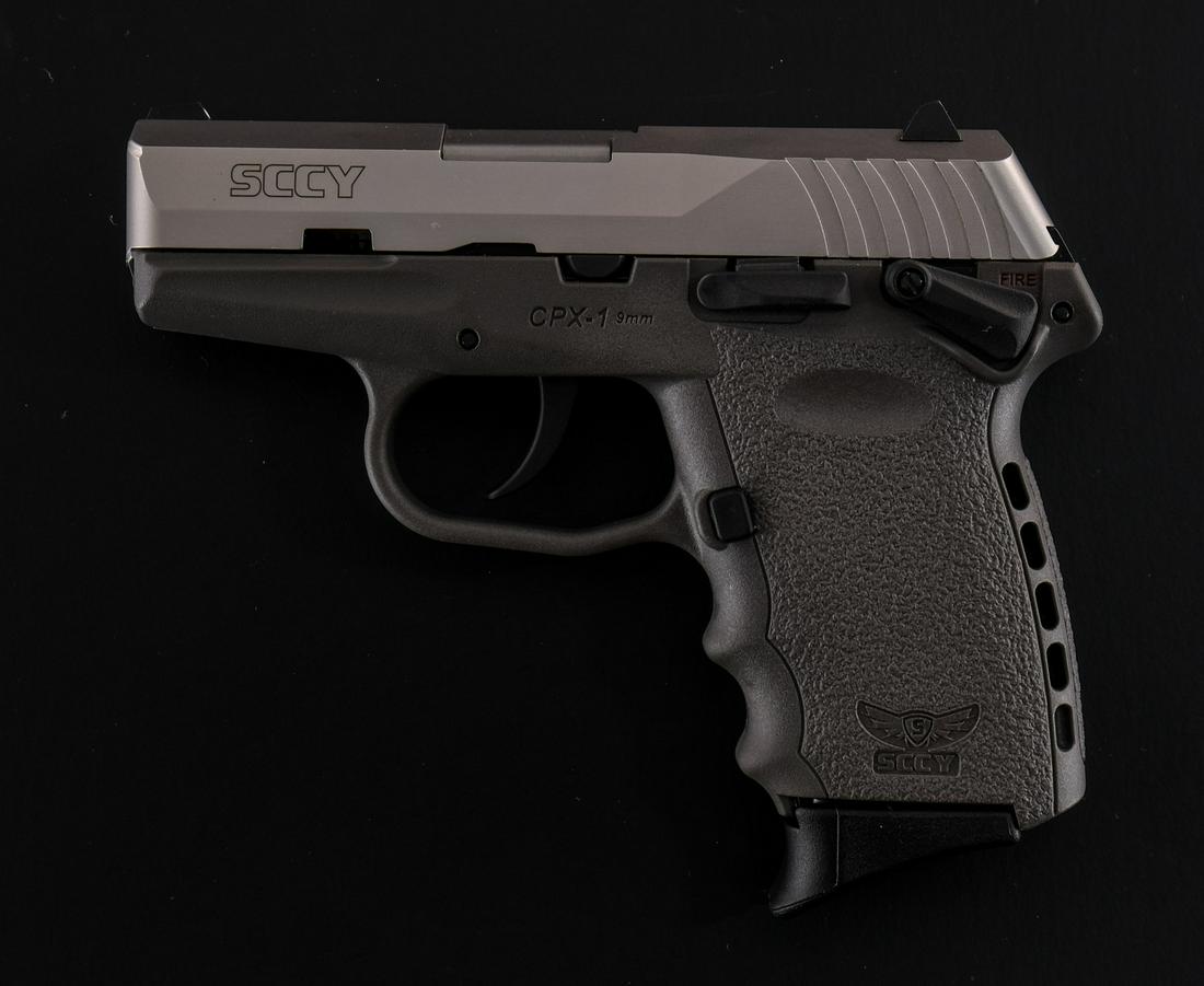 SCCY Firearms CPX-1 9mm Pistol: SCCY Firearms CPX-1 in 9mm with two ten round removable magazines and a 3" barrel in grey frame with stainless slide. This double action only semi-automatic pistol is new old stock never being fired o