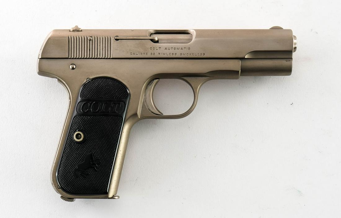 Colt 1903 Hammerless .32 ACP Pistol: Colt 1903 Pocket Hammerless in .32 ACP type 3 with one eight round removable magazine and a 3.75" barrel. The "Colt" plastic grip plates are in very good condition with light handling wear no damage. 