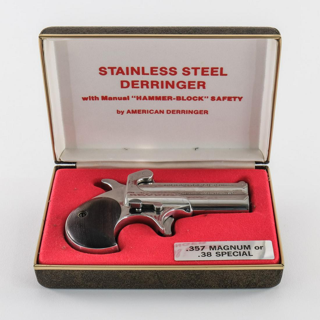 American Derringer Corp M-1 .357 Mag/.38 Spl: American Derringer Corporation M-1 in .357 magnum and .38 special with a two shot capacity and a 3" barrel. The wood grip plates are in excellent condition with no signs of wear. The polished stainles