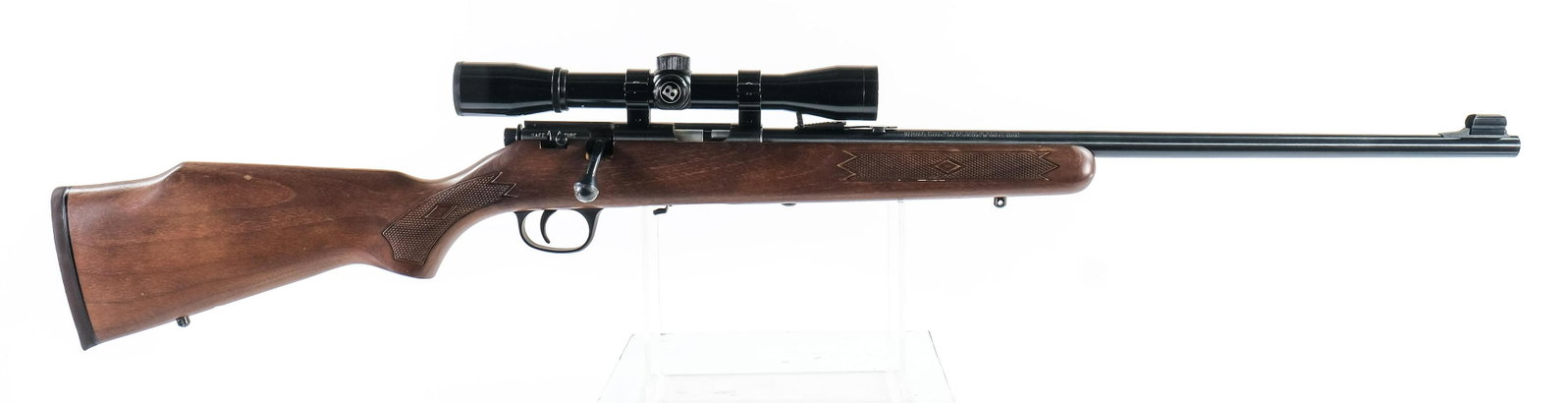 Marlin 882 .22WMR Bolt Action Rifle: Excellent, lightly used Marlin model 882 in .22 WMR (.22 Mag) with Bushnell scope. Missing magazine. Bluing is near perfect. Wood has storage and handling scuffs / scratches. Action is smooth. Hooded 
