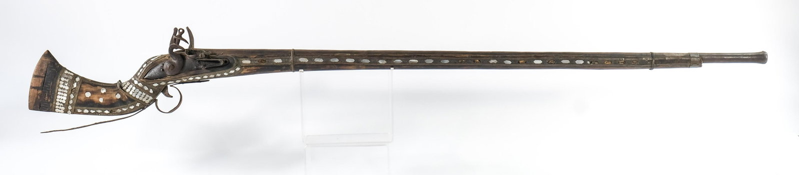 British East India Company flintlock: Rifle Middle Eastern Jezail Musket with mother of pearl inlay. Rare British East India flintlock was used as fire control. Gun is for parts, poor condition all around. NO FFL NEEDED