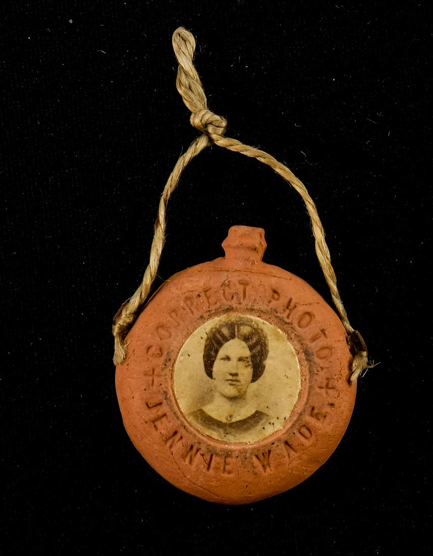 Civil War Jennie Wade Clay Pendant: Clay Canteen-form Pendant with real photo. Impressed: Correct Photo Jennie Wade, The Only Lady Killed at Gettysburg, July 2 1863. Good condition: 1.5"