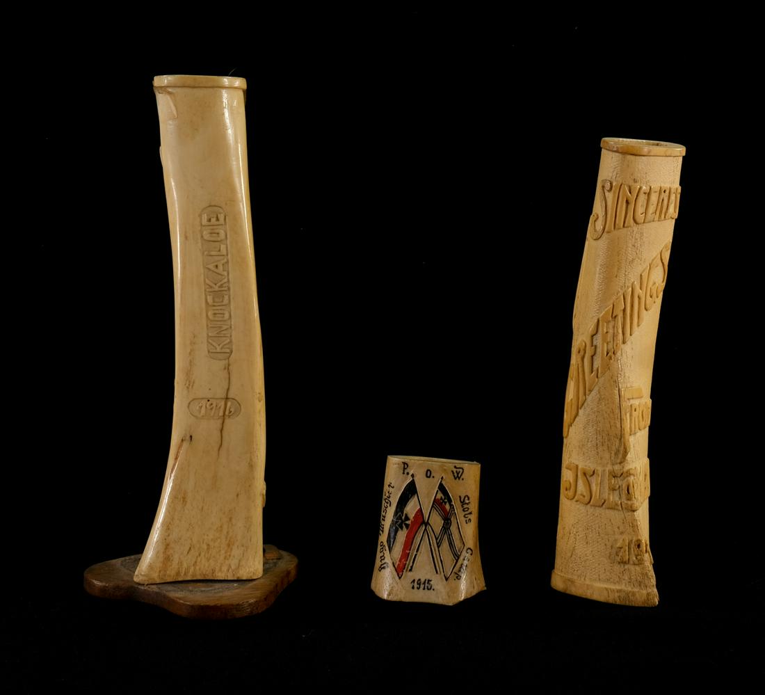 3 pcs WWI POW / Trench Art: Carved Bones: Bovine Leg Bones, hand carved, painted etc. One: Sincerest Greetings from the Isle of Man 1916, 9" good patina, good condition, one smaller German Prisoner of War Carved Soup bone: Signed Hugo Ruscgle