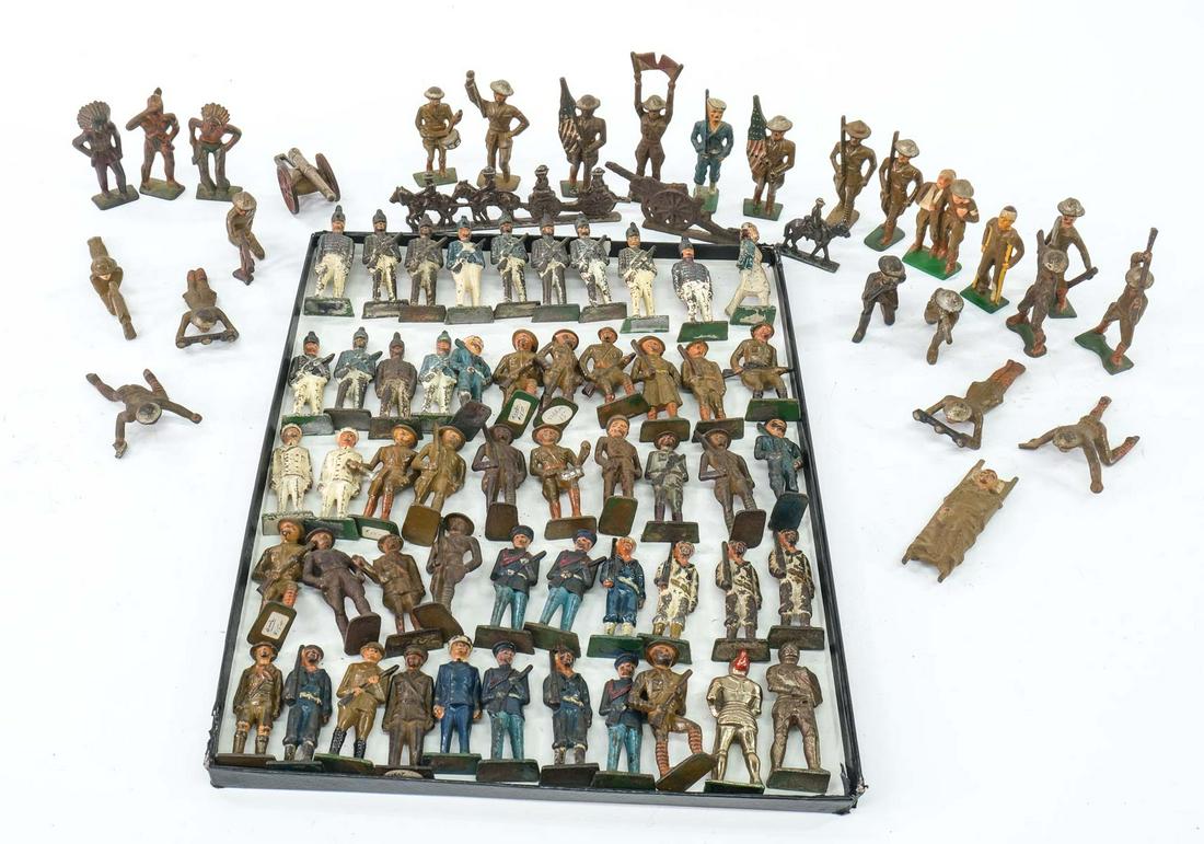 Dimestore Toy Soldiers: WWI, British, US: Manner and style of the Grey Iron Casting Company, approximately 80 Cast Iron Toy Figures, First half 20th Century. Includes British Soldiers, US Doughboy and other military together with Indian Brave