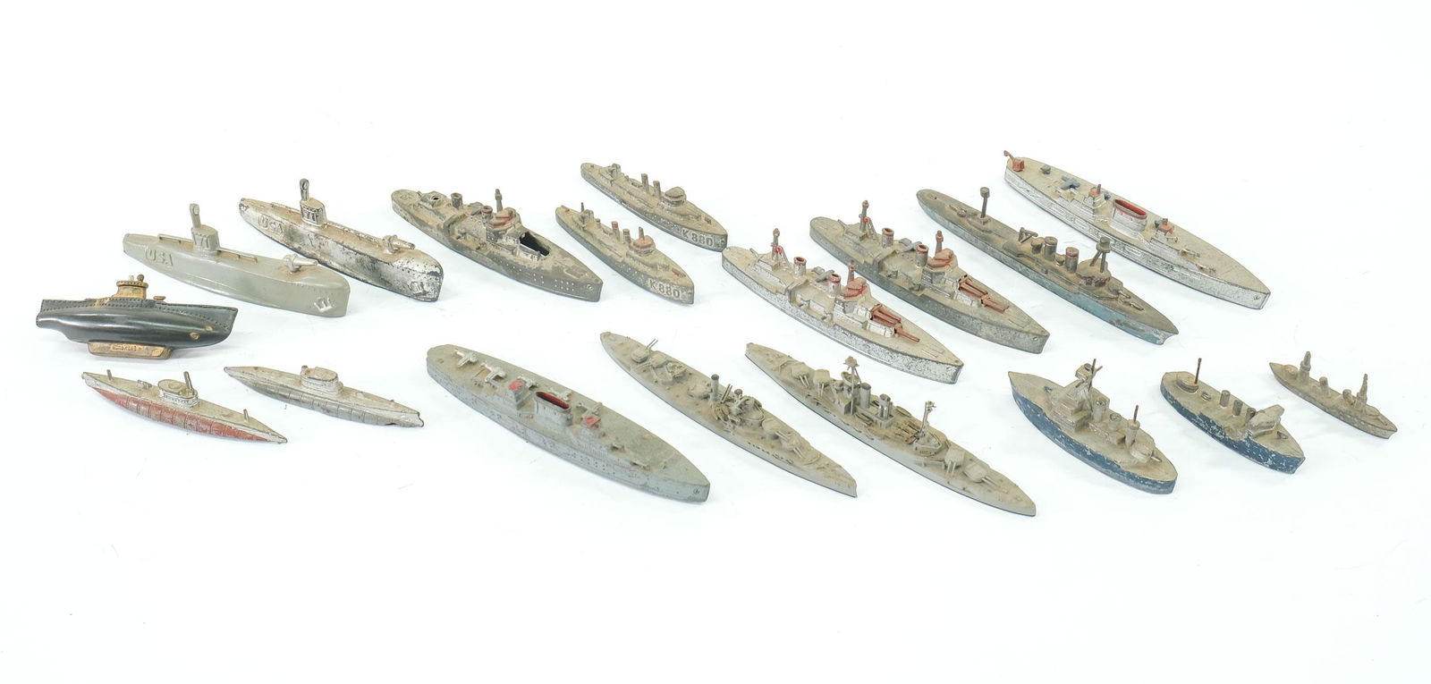 Dimestore Toy and Model Battleships: 18 pcs. Cast metal Vintage Toy Navy Ships, mostly Tootsietoy. Also includes unmarked lead, one Hong Kong Plastic, and several unmarked Naval warships. Played with condition, losses, damage. Keywords: