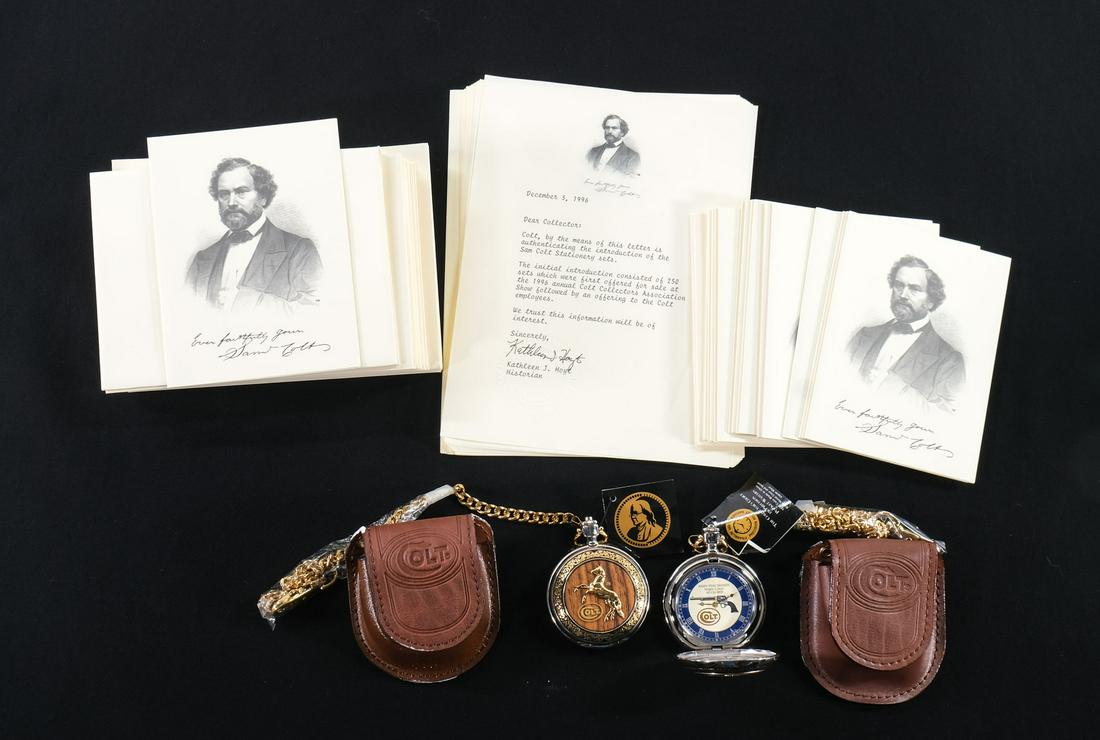 Colt Watches and Stationary Group: 2 Colt Commemorative Watches, Each watch commemorates the Colt Army Peacemaker SAA . Both appear new in the box with only storage and handling scuffs. Also included is one box of Samuel Colt Stationar