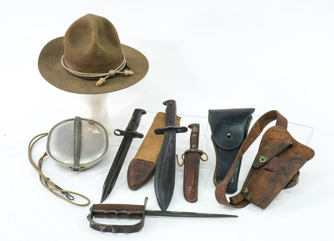 US Military Knives Bayonets Mixed Lot: Lot contains: Triangle trench knife (Knuckle Duster), Small "1901, US" bayonet knife, WWI US 1917 Bolo knife marked "ACCO Chicago 1919; England; US 1917" with canvas and leather belt sheath frog, WWI 
