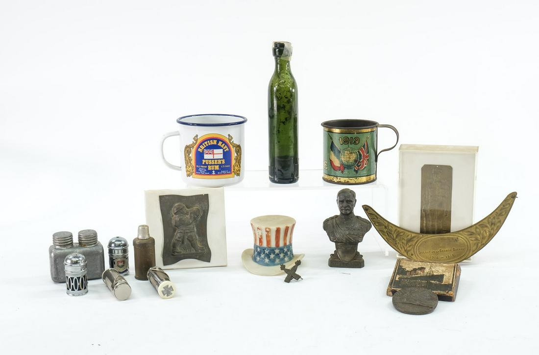 WWI Collectibles, Relics: Includes a period cased replica of the German Lusitania Medal, A Brass Relief of a soldier, A Milk Glass Uncle Sam Hat, A Later Pusser Rum Enamel Cup, a Cast metal bust of General Pershing, a 1919 Tin
