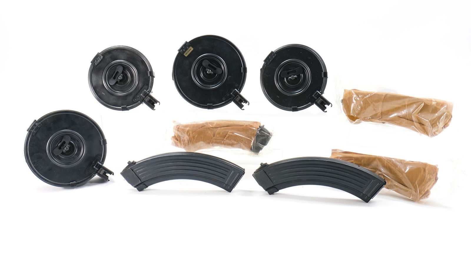Chinese AK Drums & Magazines: Hard to find a nicer lot of AK-47 mags. Lot includes 2 100rd Drums, 2 50rd drums, 2 40rd Magazines, and 3 30rd magazines. (9 pieces total). Appear to be all Chinese manufacture. These were discontinue