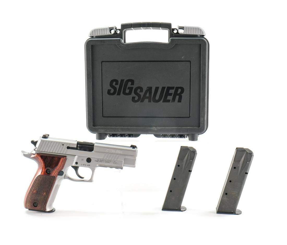 Sig Sauer P226 Elite 9mm Pistol: From Sig Sauer with frame made in Germany we have a P226 Elite chambered in 9mm. This stainless steel pistol features an ergonomic beavertail grip, front cocking serration, front strap checkering, Sig